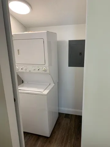 a utility room with a sink dryer and washer