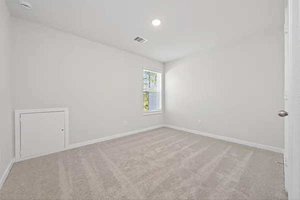 an empty room with a window