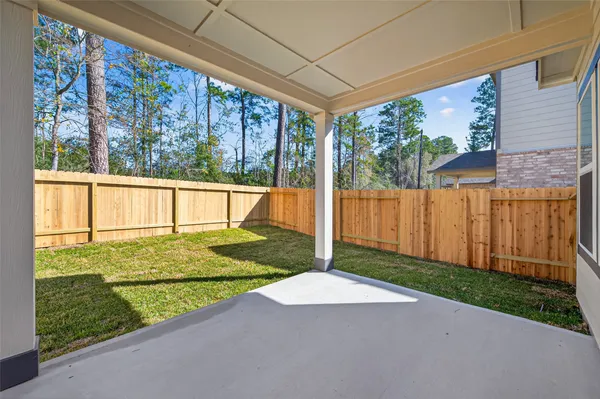 a view of backyard with green space