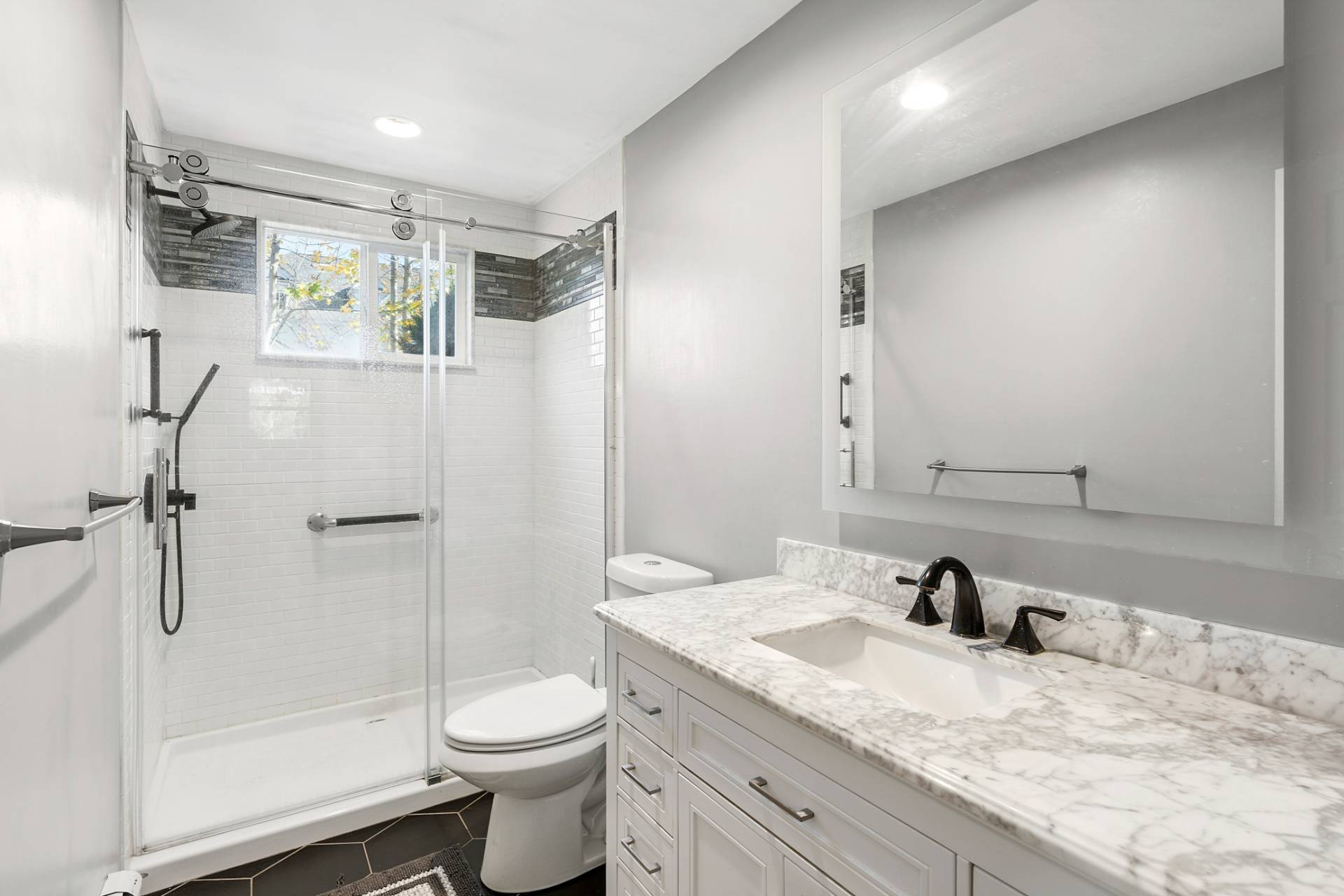 201 Herrick Road Southampton, NY 11968 - Photo 18 of 29 a bathroom with a granite countertop sink toilet and shower