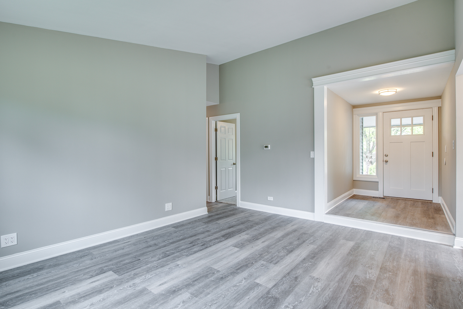 106 Foxcroft Road Naperville, IL 60565 - Photo 2 of 21 wooden floor in an empty room