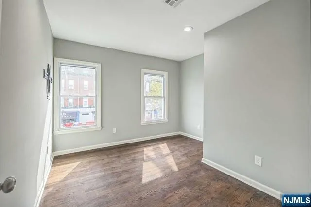 an empty room with windows