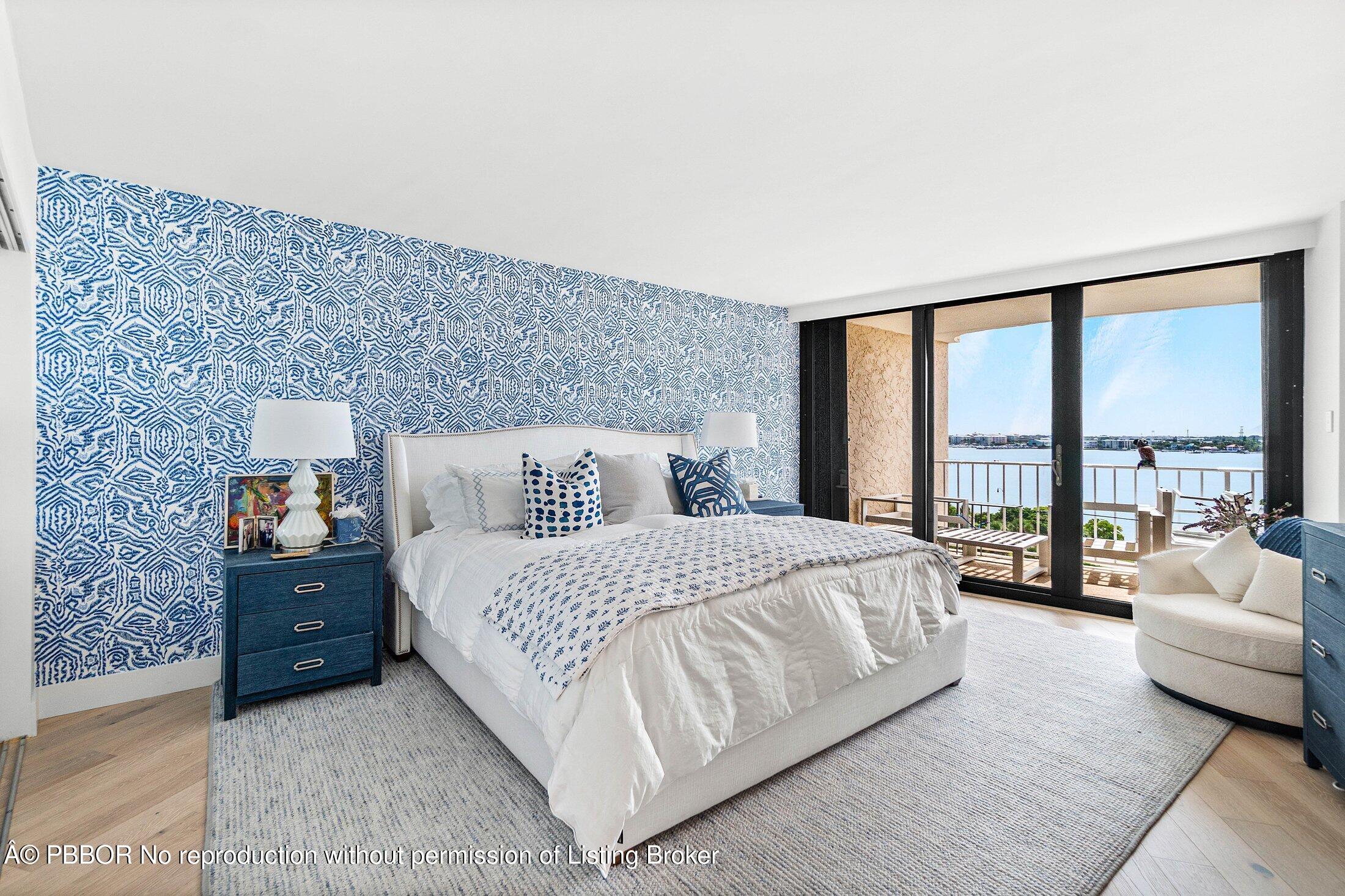 3400 South Ocean Boulevard, Unit 7AII Palm Beach, FL 33480 - Photo 13 of 37 a large bedroom with a bed and large windows