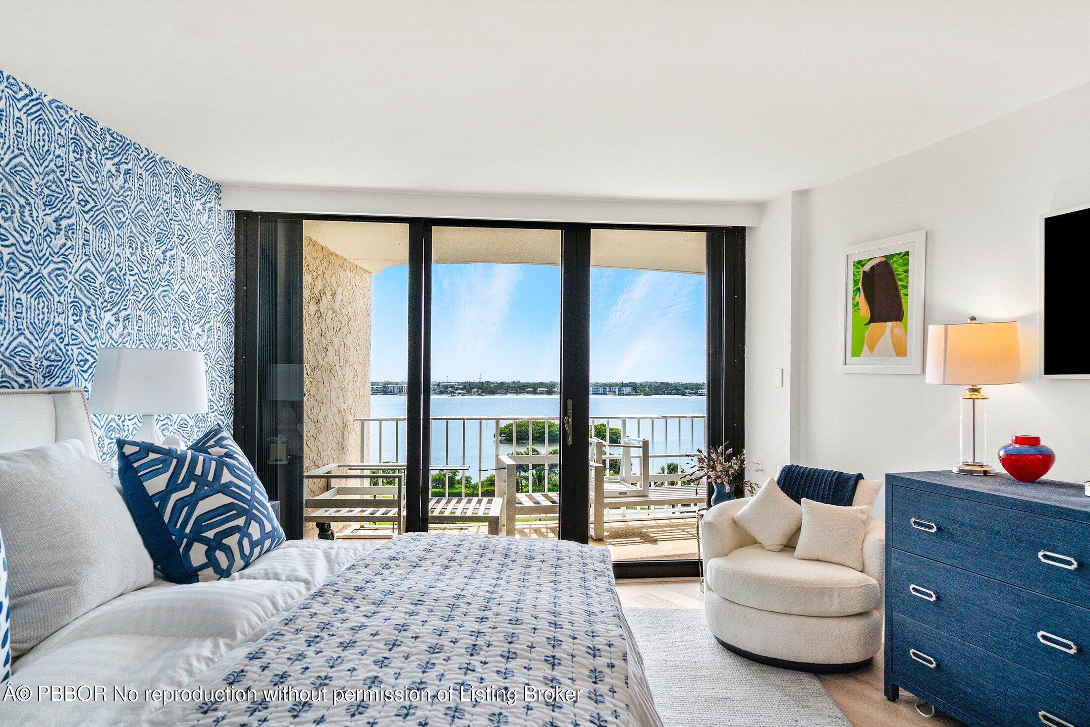 3400 South Ocean Boulevard, Unit 7AII Palm Beach, FL 33480 - Photo 14 of 37 a bedroom with furniture and a large window