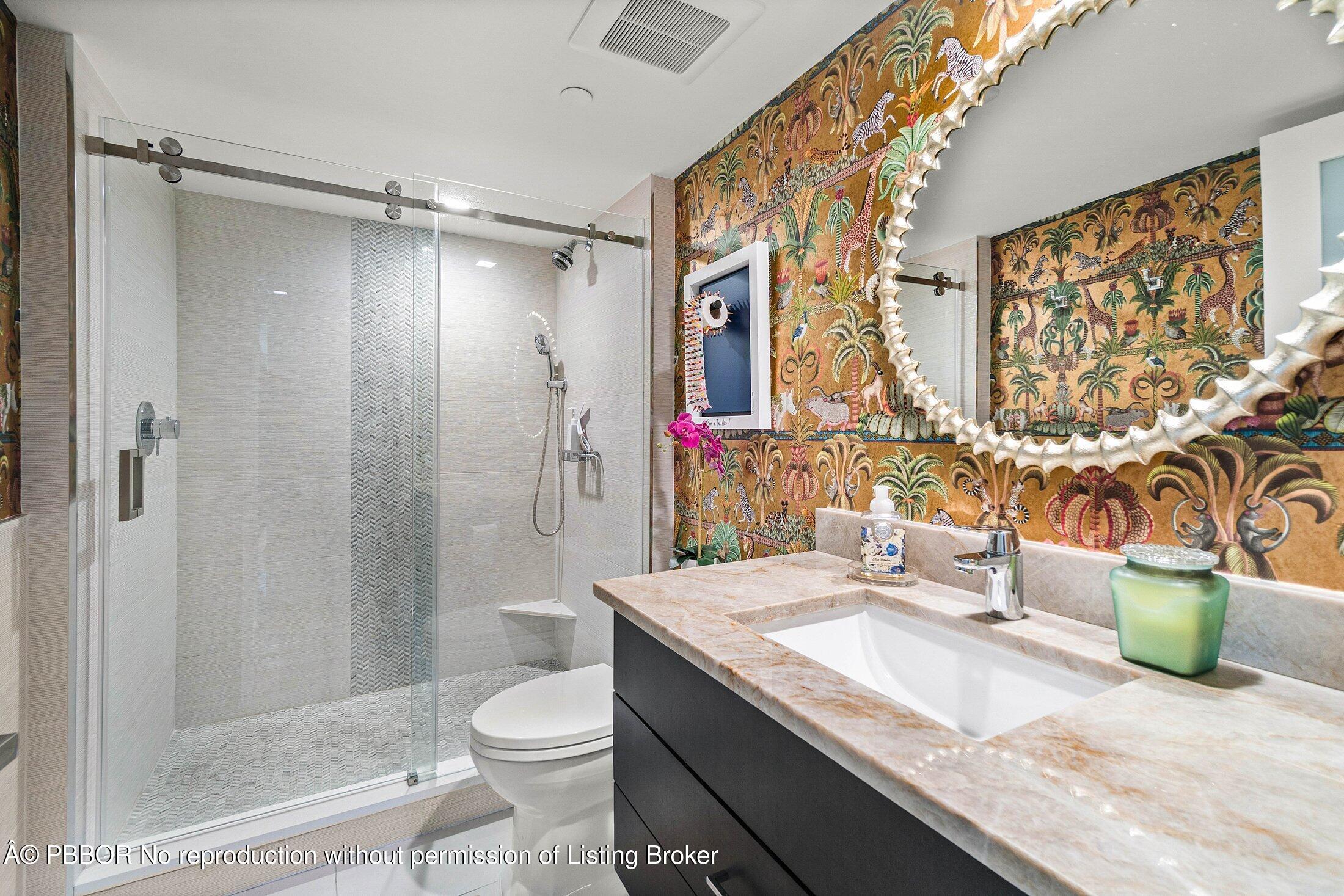 3400 South Ocean Boulevard, Unit 7AII Palm Beach, FL 33480 - Photo 20 of 37 a bathroom with a granite countertop sink a toilet and shower