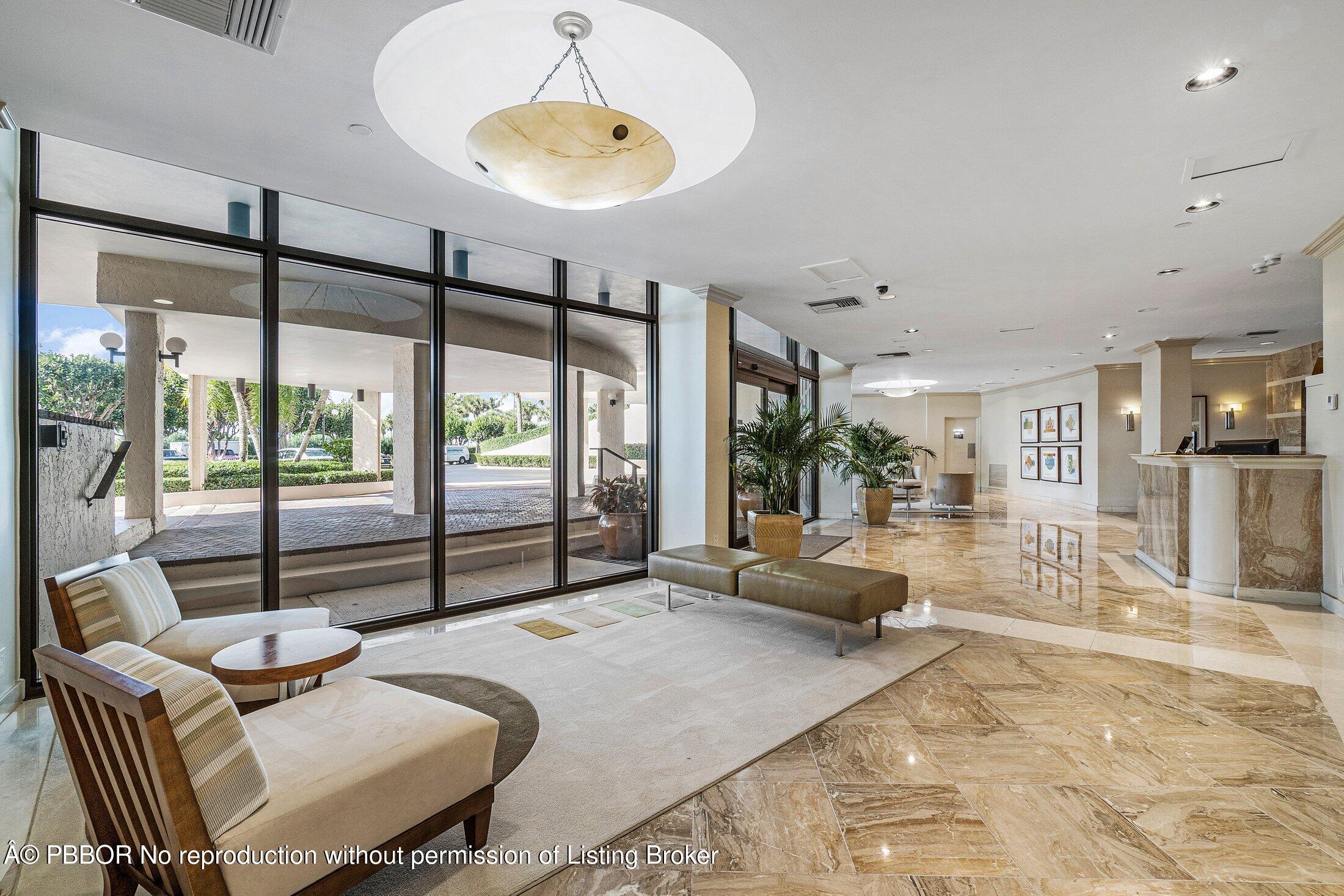 3400 South Ocean Boulevard, Unit 7AII Palm Beach, FL 33480 - Photo 33 of 37 a bedroom with furniture and large windows