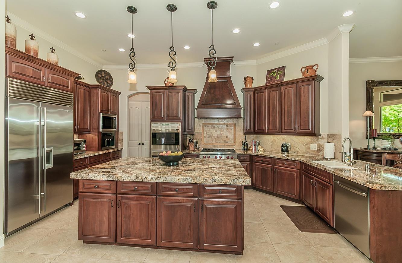 1807 North Rector Avenue Clovis, CA 93619 - Photo 14 of 55 a kitchen with a sink a counter space appliances and cabinets