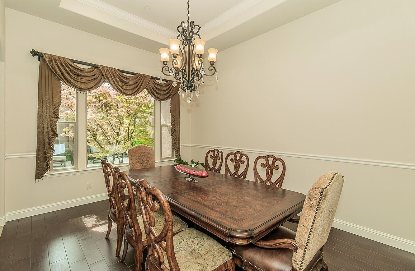 1807 North Rector Avenue Clovis, CA 93619 - Photo 17 of 55 a view of a dining room with furniture window and wooden floor