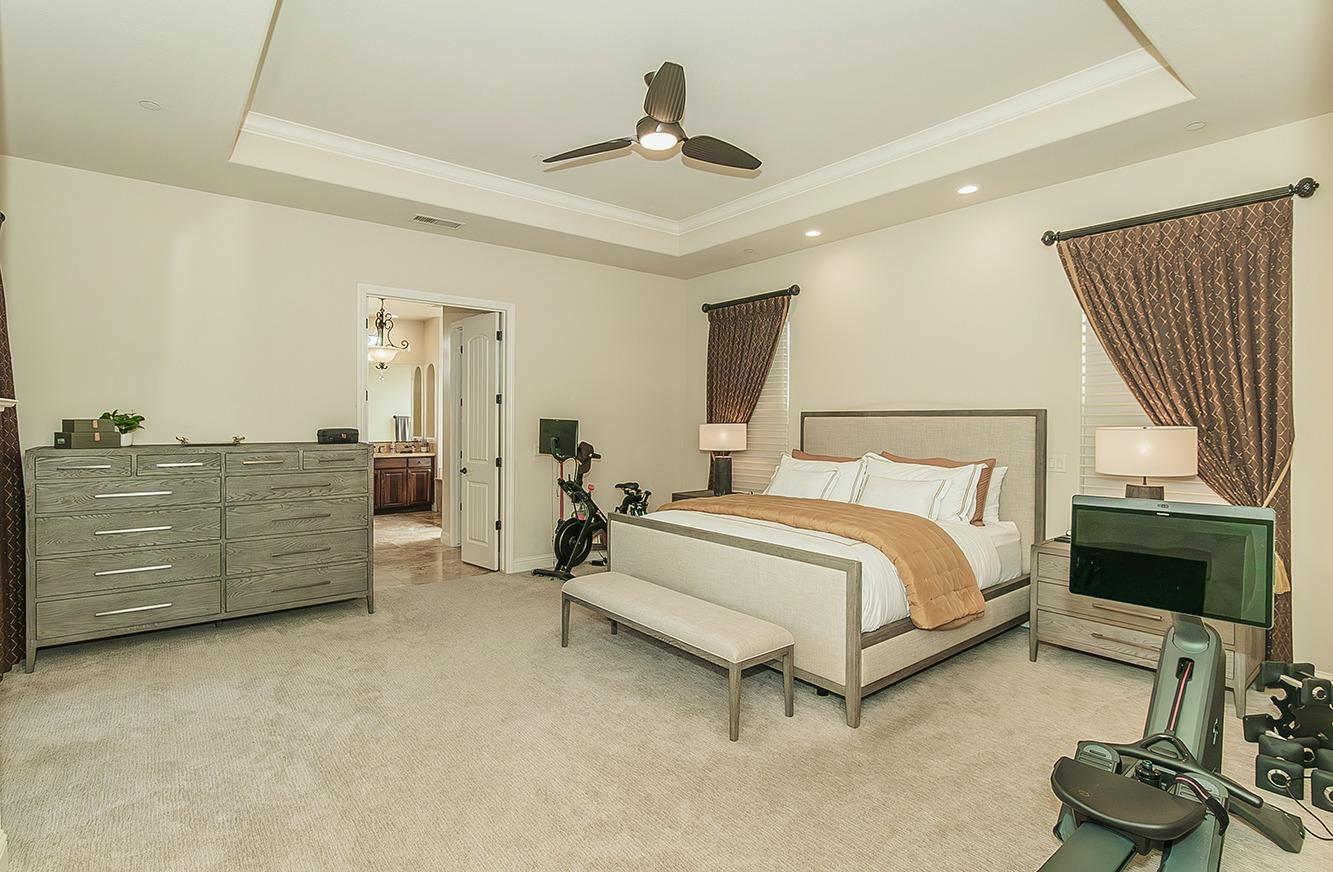 1807 North Rector Avenue Clovis, CA 93619 - Photo 18 of 55 a bed room with a bed and a chair