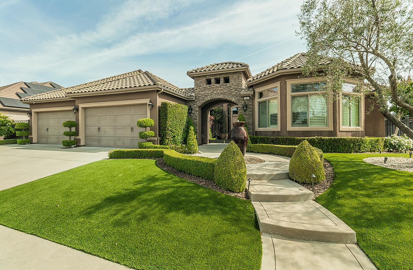 1807 North Rector Avenue Clovis, CA 93619 - Photo 2 of 55 a front view of a house with garden