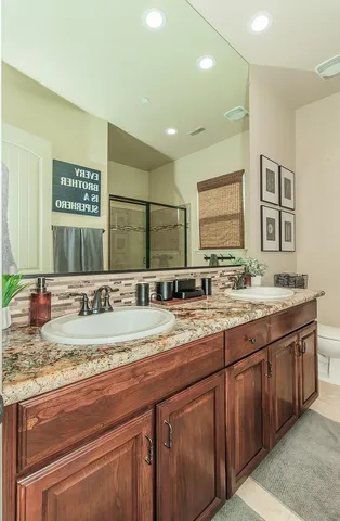 a living room with furniture fireplace and flat screen tv