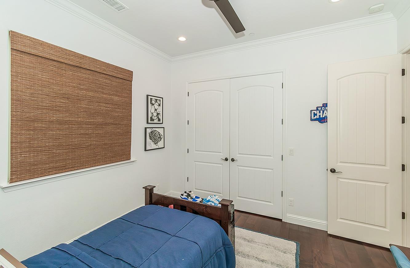 1807 North Rector Avenue Clovis, CA 93619 - Photo 31 of 55 a bedroom with a bed and wooden floor