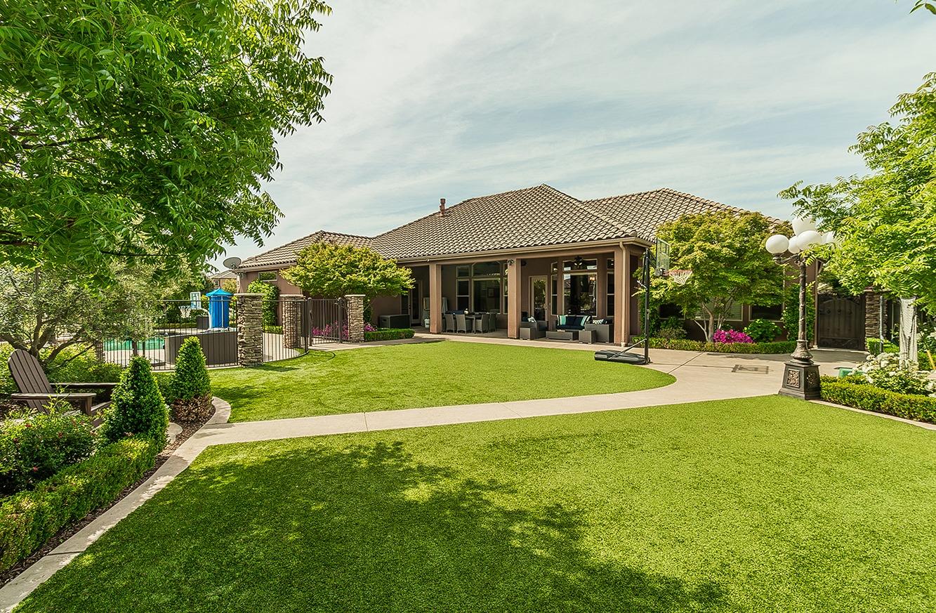 1807 North Rector Avenue Clovis, CA 93619 - Photo 36 of 55 a front view of a house with a yard