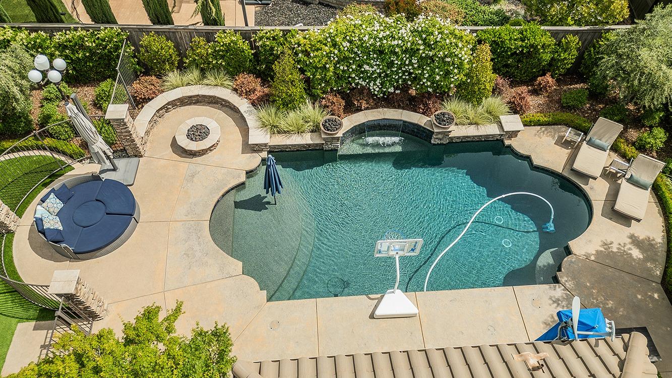 1807 North Rector Avenue Clovis, CA 93619 - Photo 51 of 55 an aerial view of a house with outdoor space and swimming pool