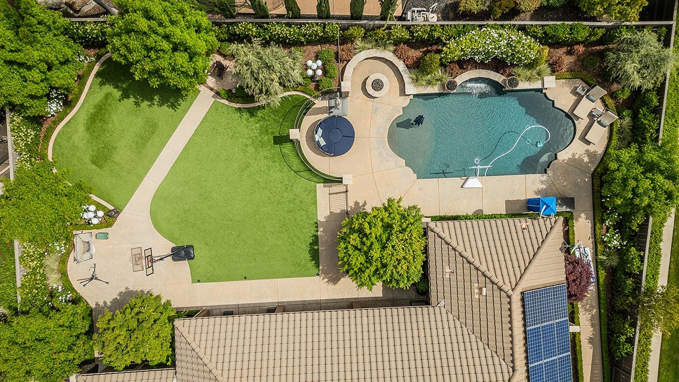 1807 North Rector Avenue Clovis, CA 93619 - Photo 52 of 55 an outdoor view with swimming pool and outdoor seating