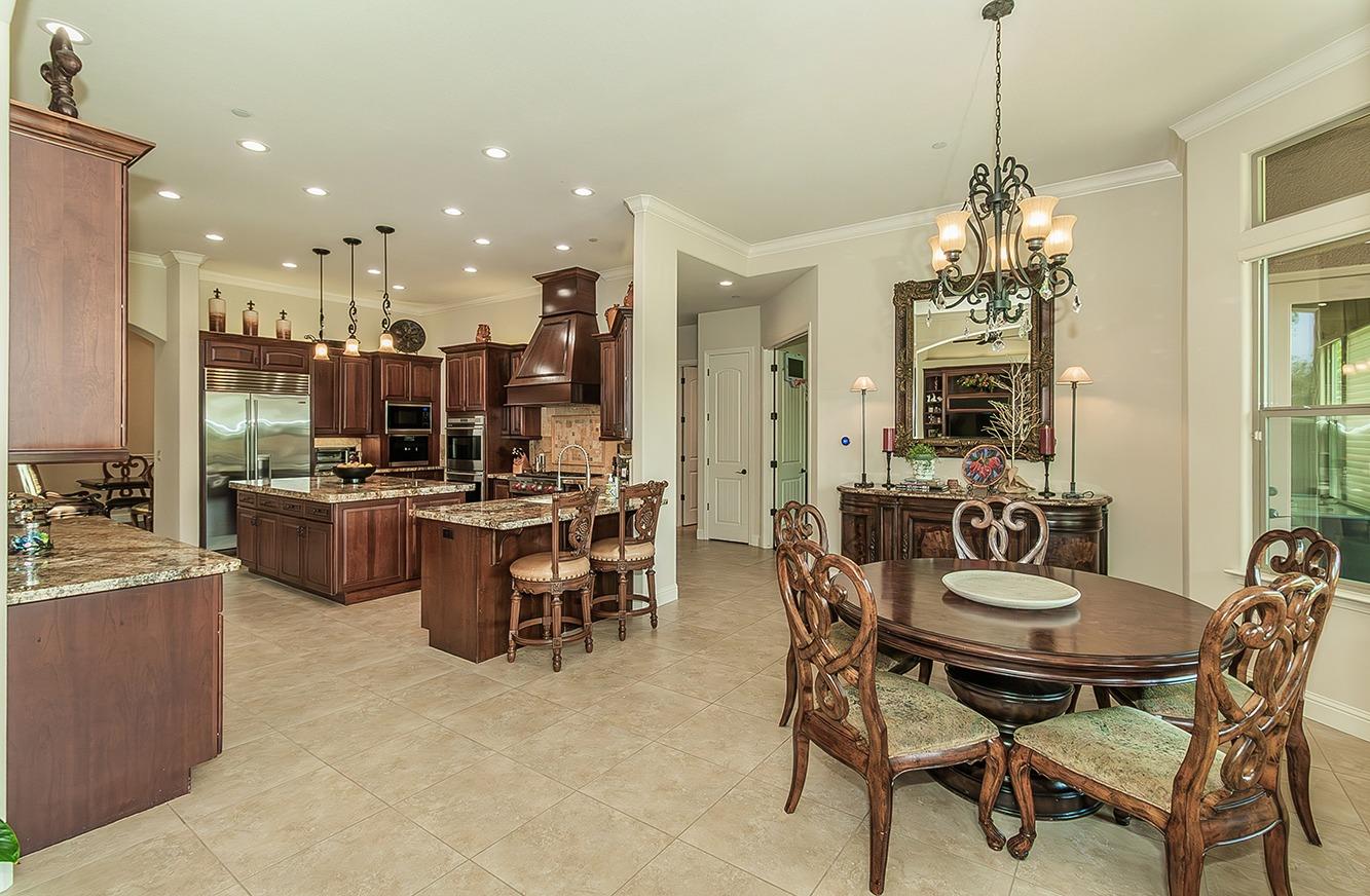 1807 North Rector Avenue Clovis, CA 93619 - Photo 10 of 55 a view of a dining room with furniture and chandelier