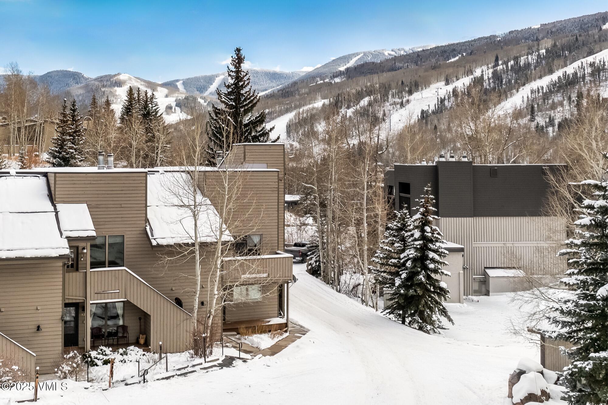 945 Red Sandstone Road, Unit A5 Vail, CO 81657 - Photo 1 of 38 a view of outdoor space and yard