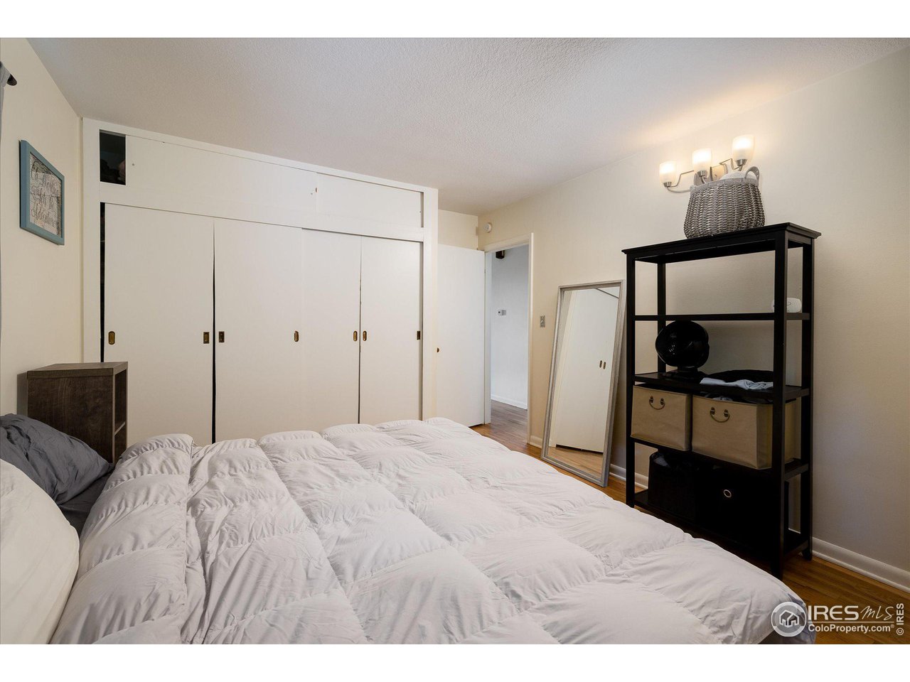 2855 4th Street Boulder, CO 80304 - Photo 12 of 37 a bedroom with a bed and a lamp