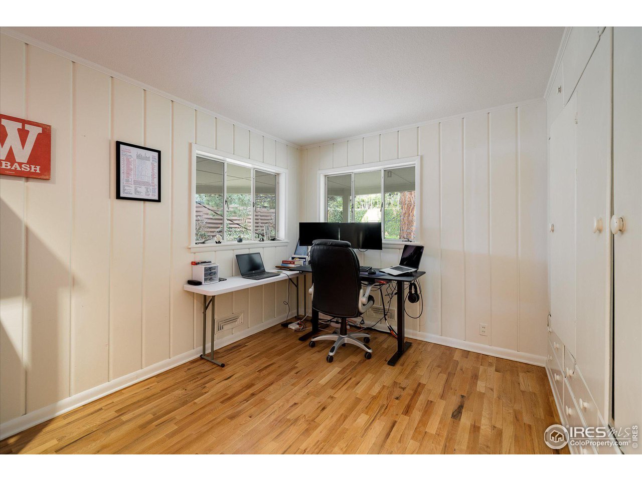 2855 4th Street Boulder, CO 80304 - Photo 15 of 37 a view of a workspace with furniture and a window