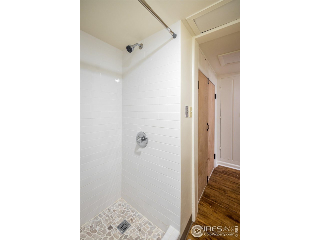 2855 4th Street Boulder, CO 80304 - Photo 21 of 37 a bathroom with a sink and a shower