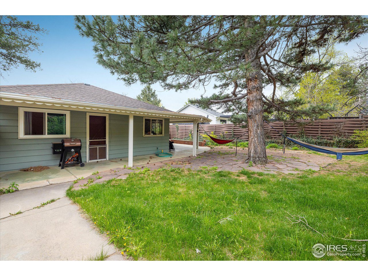 2855 4th Street Boulder, CO 80304 - Photo 25 of 37 a view of a house with a backyard porch and sitting area