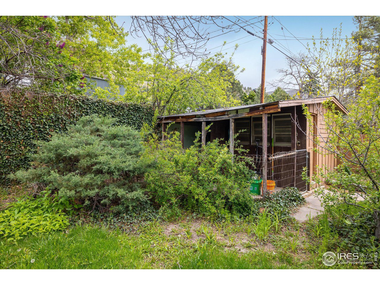 2855 4th Street Boulder, CO 80304 - Photo 28 of 37 a view of house with backyard and garden