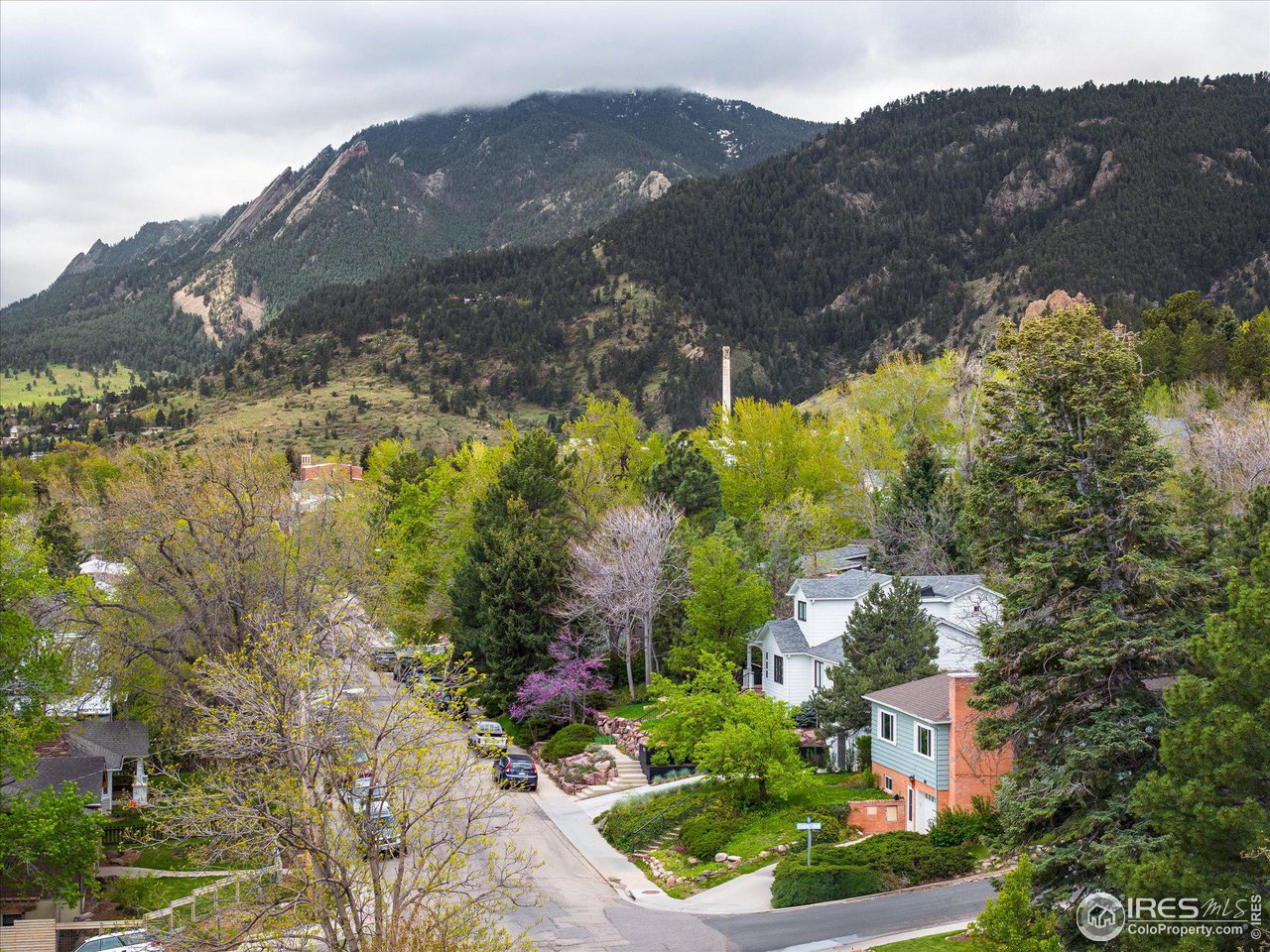 2855 4th Street Boulder, CO 80304 - Photo 32 of 37 a view of a house with a mountain and a forest