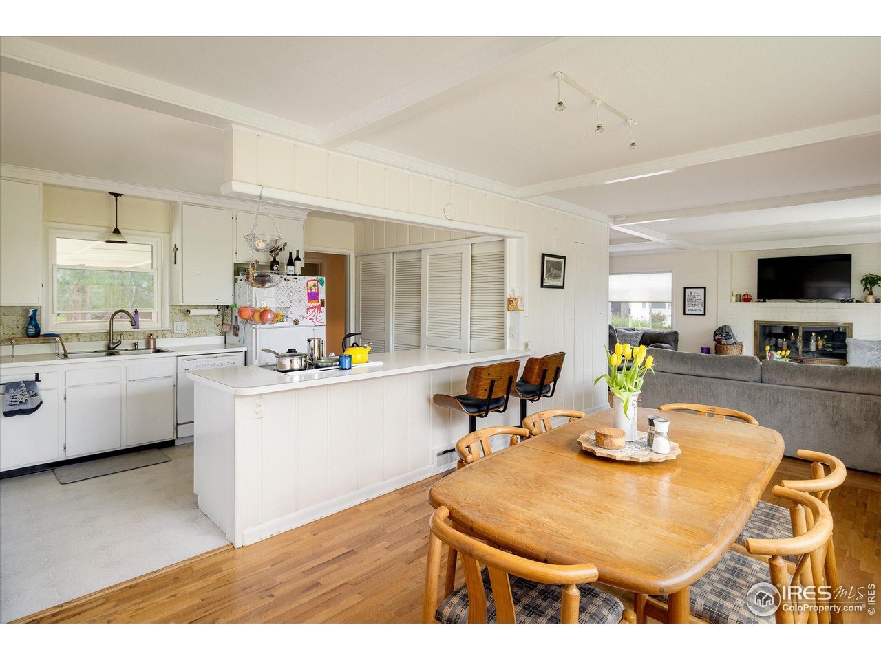 2855 4th Street Boulder, CO 80304 - Photo 7 of 37 a living room with furniture and a flat screen tv