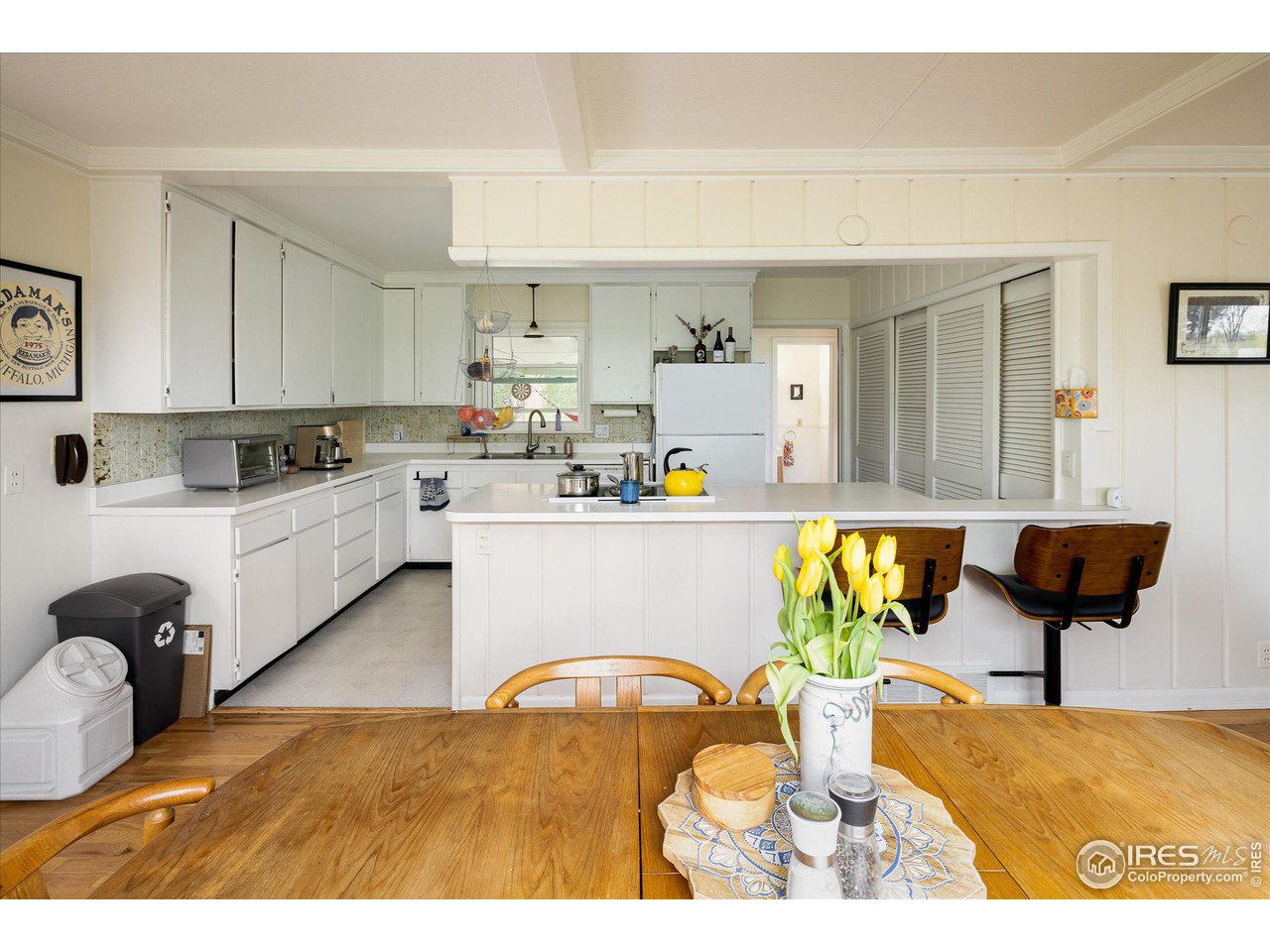 2855 4th Street Boulder, CO 80304 - Photo 8 of 37 a living room with kitchen furniture and a couch
