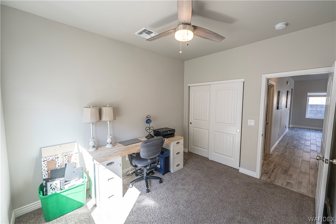 3550 North Kenneth Road Kingman, AZ 86409 - Photo 25 of 41 a workspace with furniture and a window