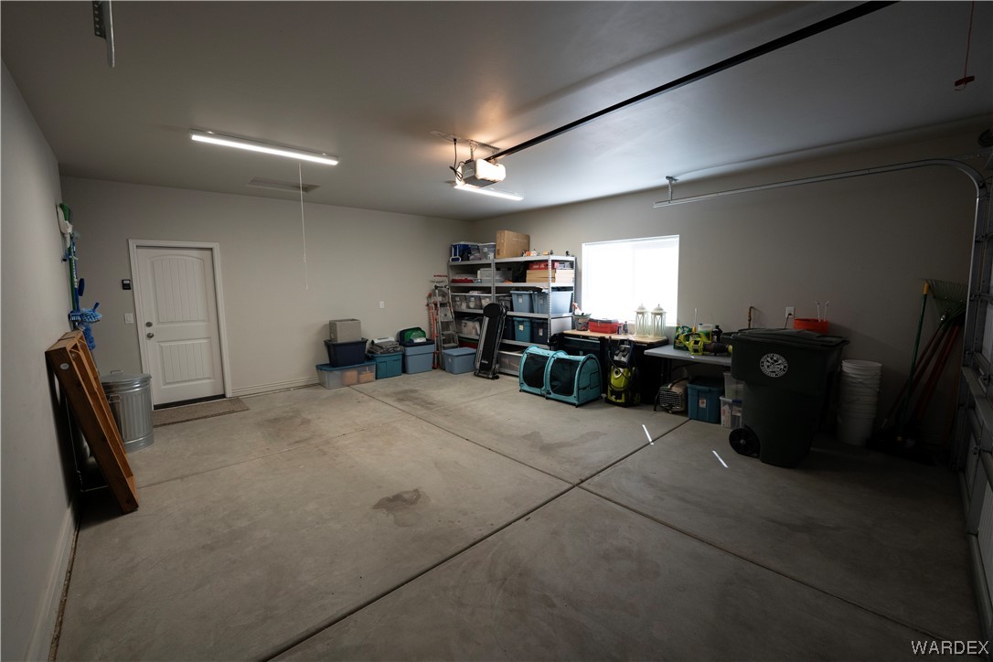 3550 North Kenneth Road Kingman, AZ 86409 - Photo 35 of 41 a room with lots of furniture and clutter