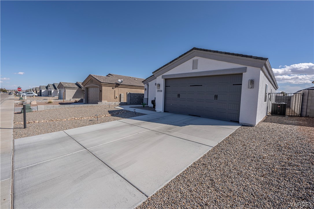 3550 North Kenneth Road Kingman, AZ 86409 - Photo 5 of 41 a view of a house with a yard