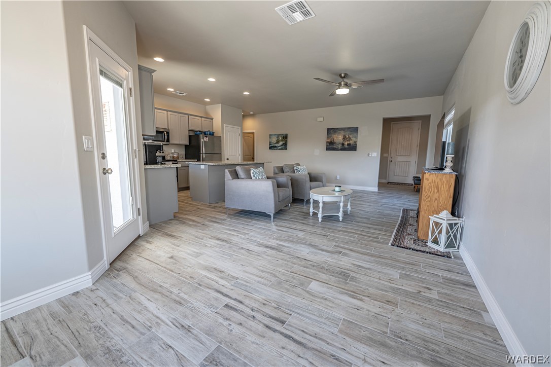 3550 North Kenneth Road Kingman, AZ 86409 - Photo 8 of 41 a living room with furniture and a wooden floor