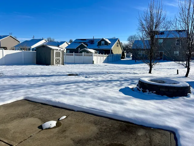a view of back yard of the house