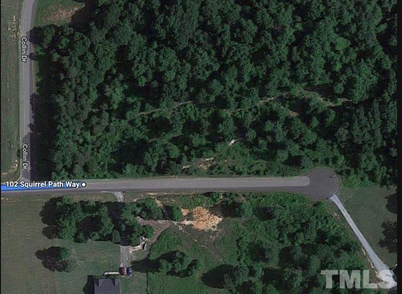 123 Squirrel Path Way, Unit TRACT 5 Roxboro, NC 27574 - Photo 1 of 3 a view of outdoor space with lots of trees