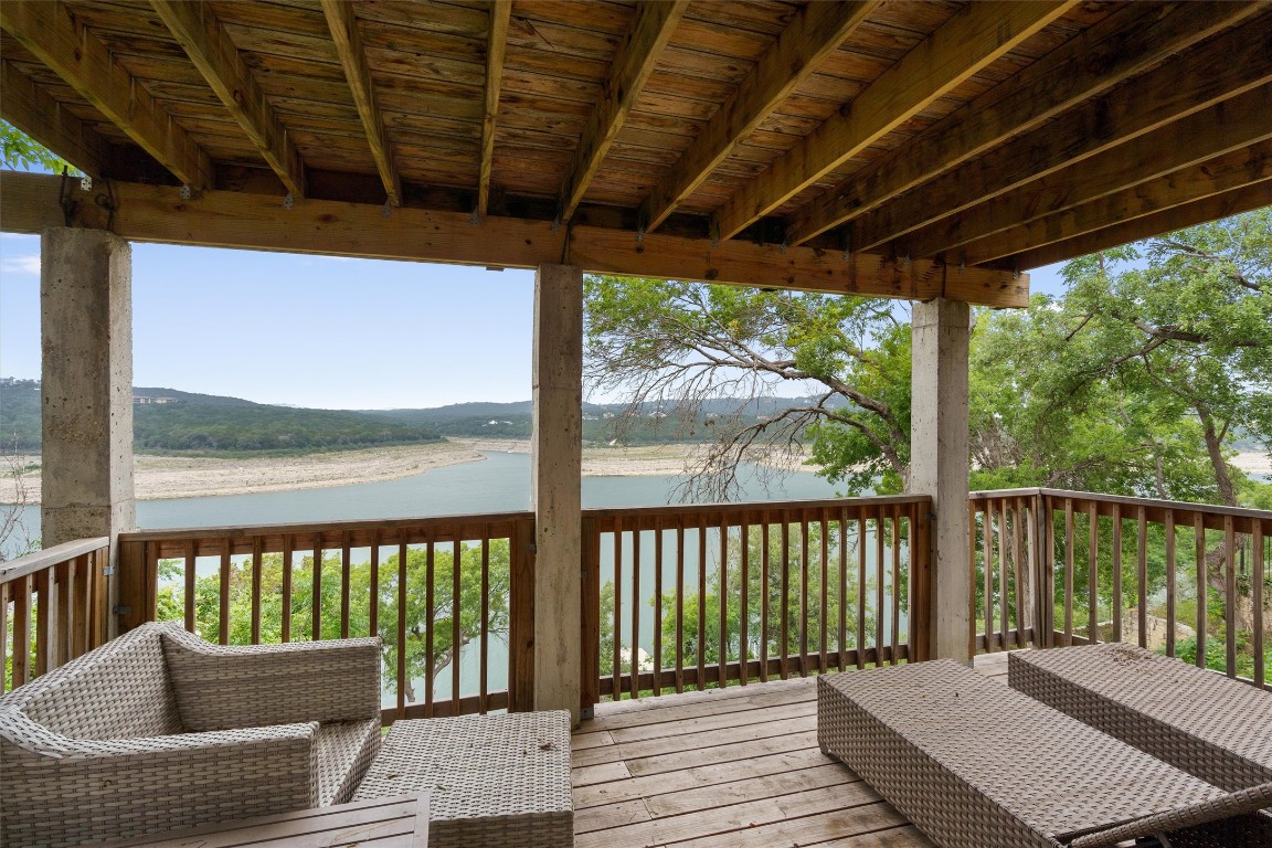 8124 Joy Road Volente, TX 78641 - Photo 1 of 1 a view of a balcony with wooden floor