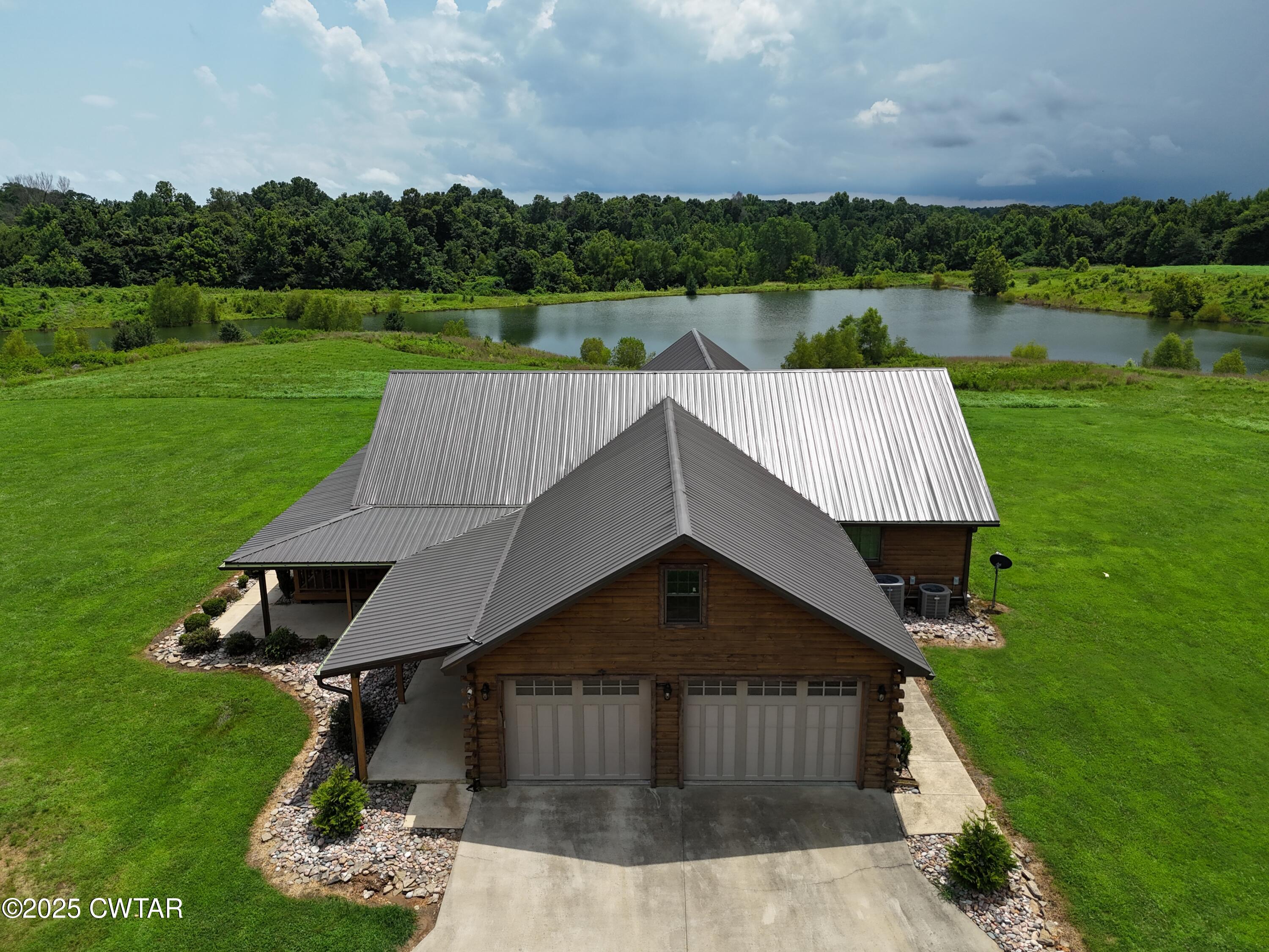 925 Cleve Duke Road Hornbeak, TN 38232 - Photo 2 of 31 DJI_20250708140546_0154_D