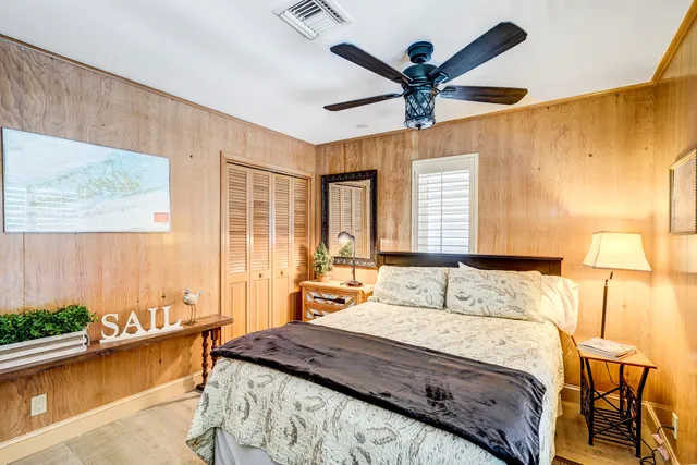 a view of a chairs and table in the balcony