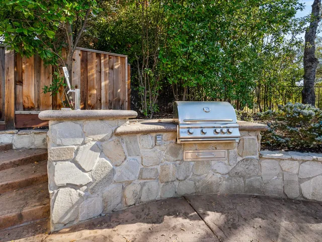 a aerial view of a house with a yard