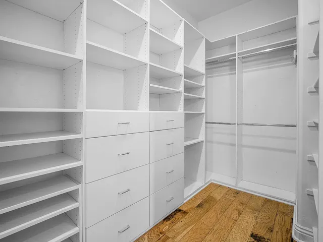 a kitchen with counter top space cabinets and stainless steel appliances