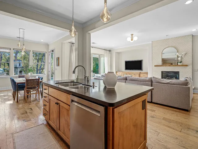 an aerial view of a house with garden space and street view