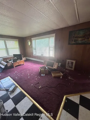 a kitchen with stainless steel appliances kitchen island granite countertop a sink and cabinets