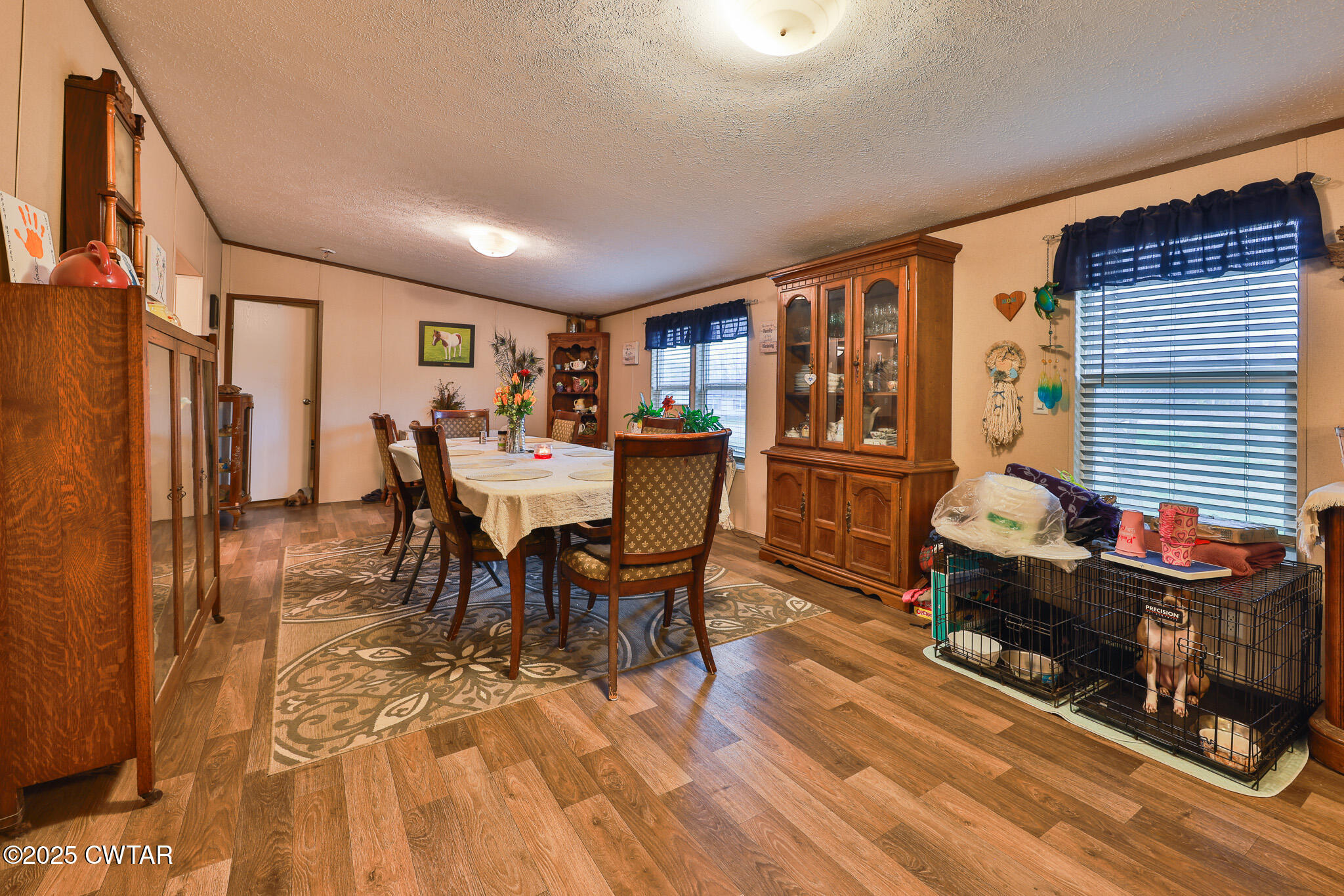 4532 Old State Rte 22 Gleason, TN 38229 - Photo 13 of 34 a dining room with furniture and wooden floor