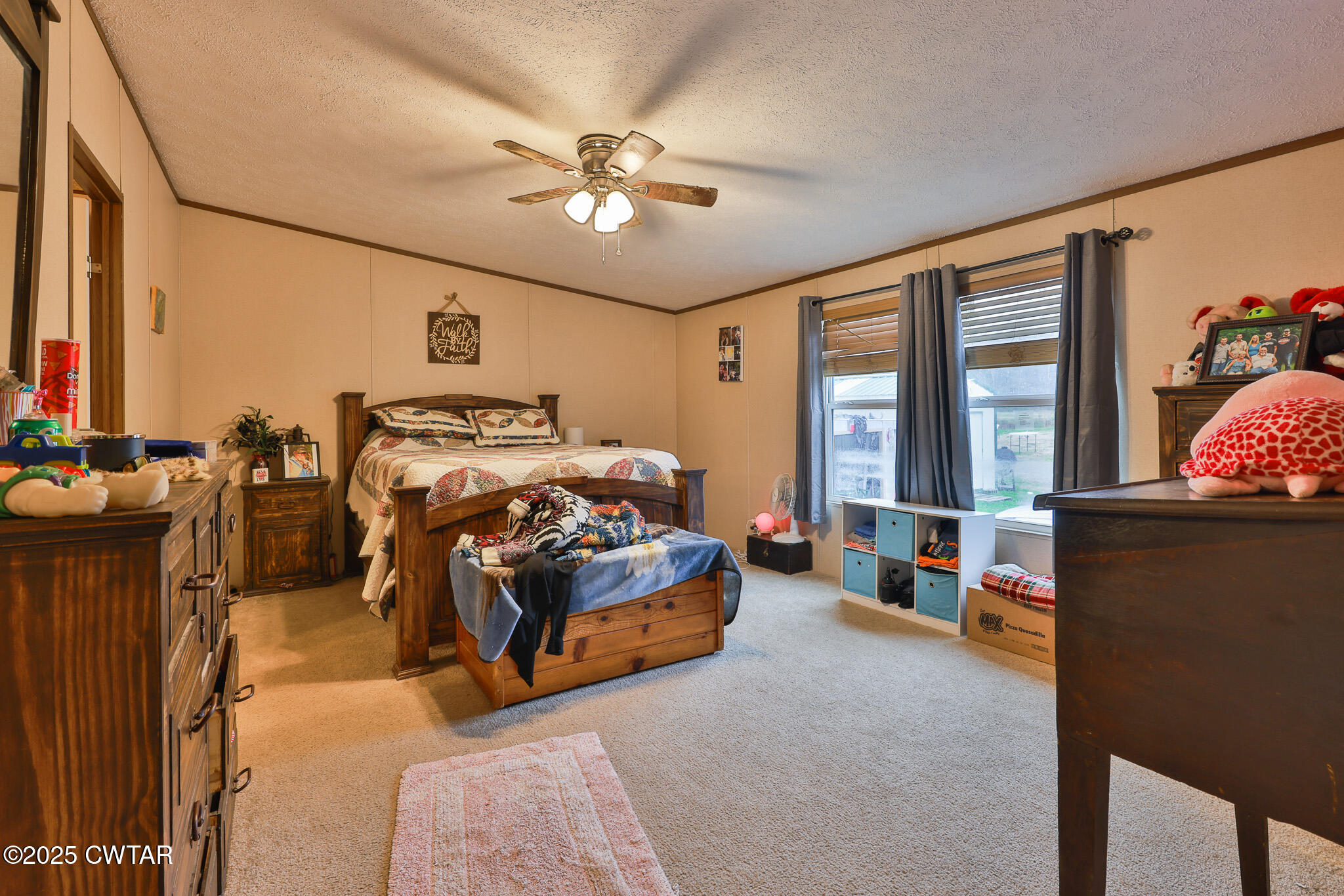 4532 Old State Rte 22 Gleason, TN 38229 - Photo 14 of 34 a bedroom with furniture and a large window