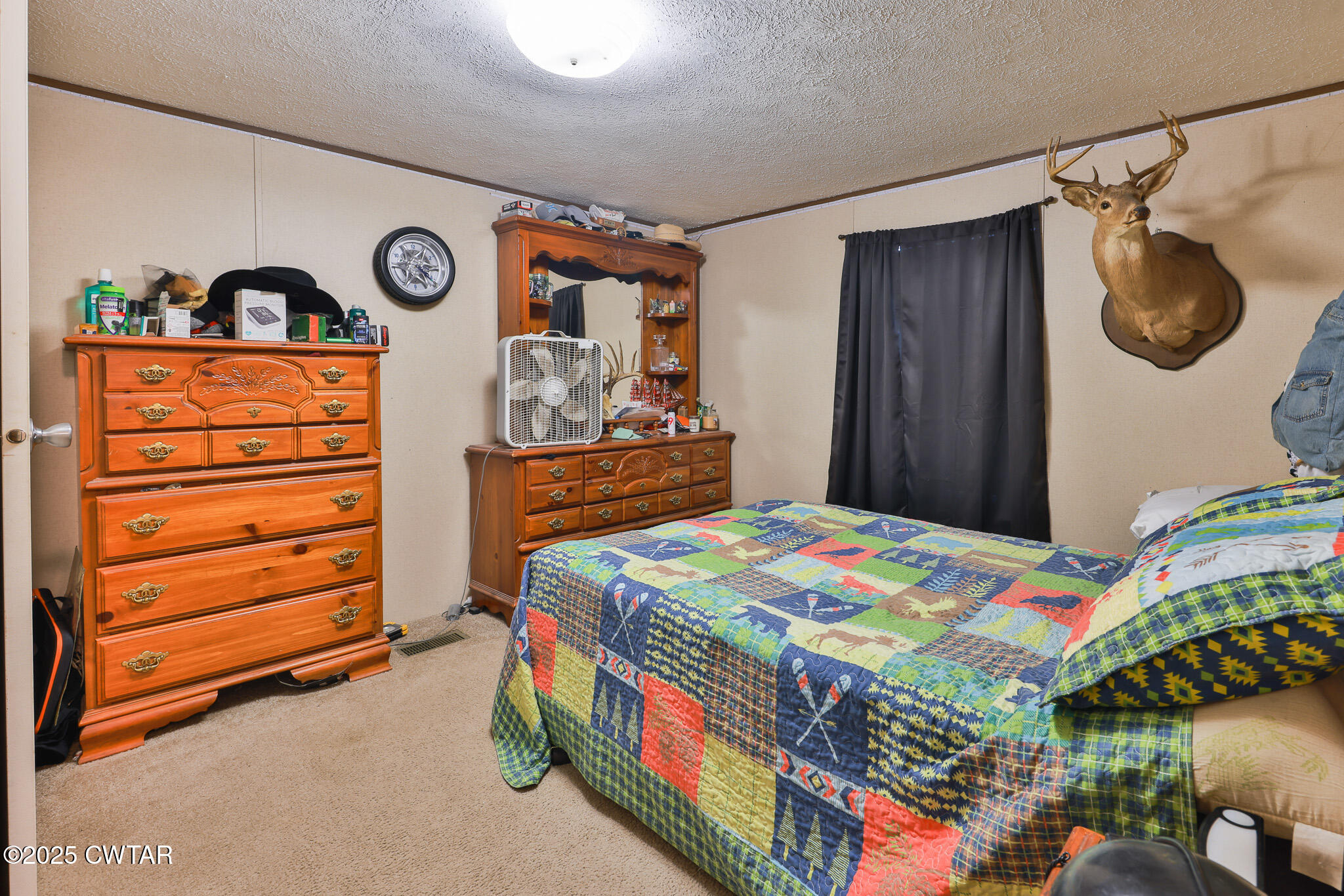 4532 Old State Rte 22 Gleason, TN 38229 - Photo 16 of 34 a bedroom with a bed and a window
