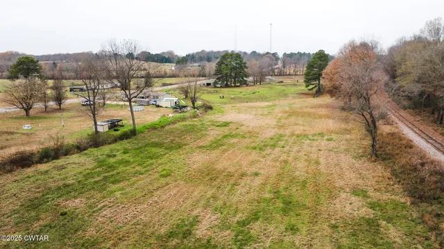 a view of a town with mountains in the background