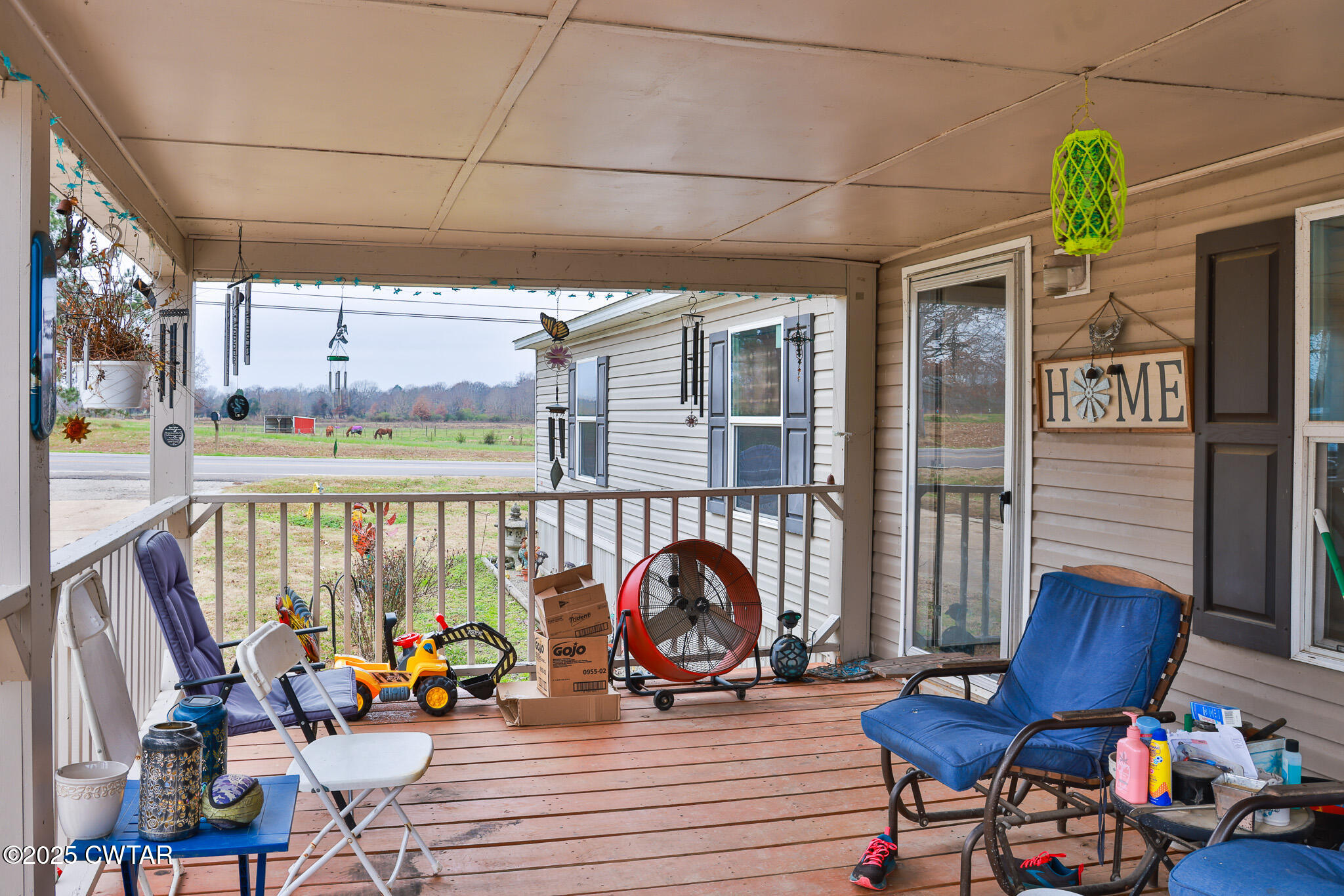 4532 Old State Rte 22 Gleason, TN 38229 - Photo 8 of 34 a view of a balcony with chairs
