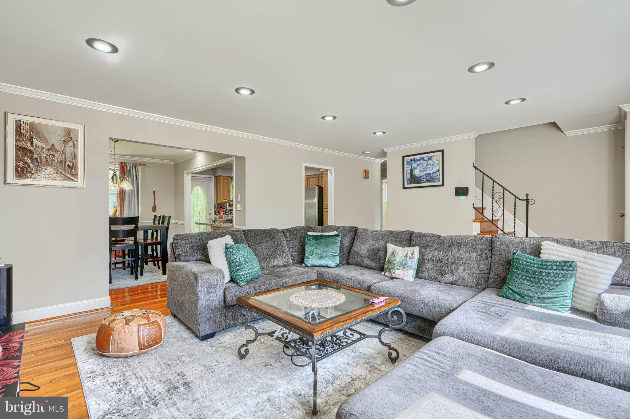 3708 Cassen Road Randallstown, MD 21133 - Photo 7 of 38 a living room with furniture a rug and a table
