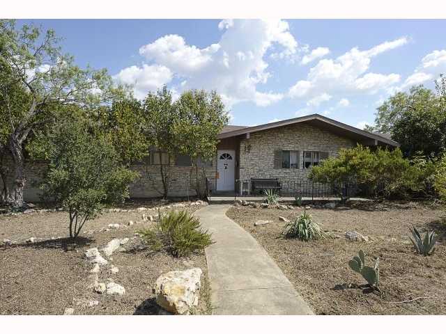 1507 Rabb Road Austin, TX 78704 - Photo 1 of 1 a backyard of a house with table and chairs