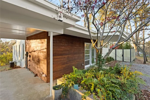a yellow house with outdoor space